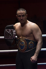 Image showing kick boxer with his championship belt