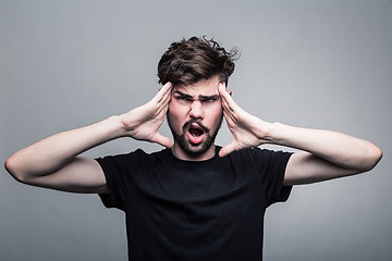 Image showing Man feeling pain,  with gray background