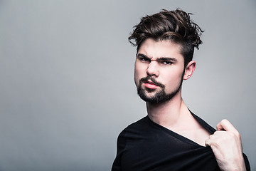 Image showing Professional studio portrait of young handsome man