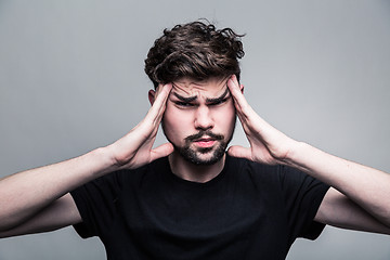 Image showing Man feeling pain,  with gray background