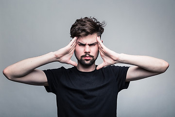 Image showing Man feeling pain,  with gray background