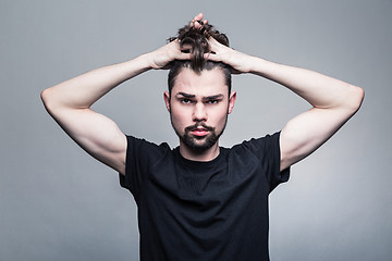 Image showing Professional studio portrait of young handsome man