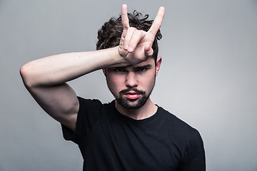 Image showing Portrait of brutal bearded man with horns