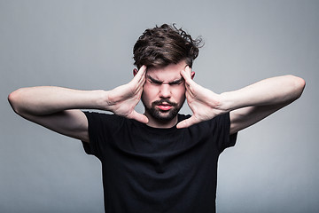 Image showing Man feeling pain,  with gray background