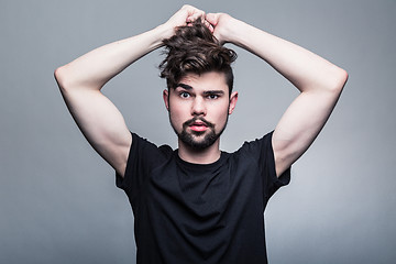 Image showing Professional studio portrait of young handsome man