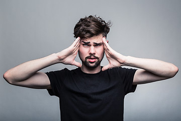 Image showing Man feeling pain,  with gray background