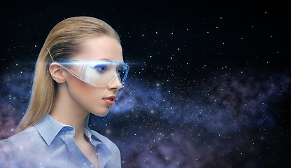 Image showing woman in virtual reality glasses over space