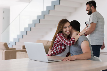 Image showing happy young couple buying online