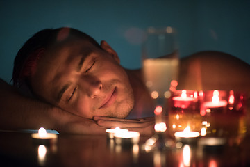 Image showing man relaxing in the jacuzzi