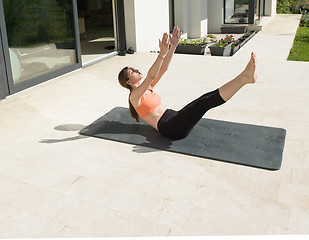 Image showing woman doing morning yoga exercises