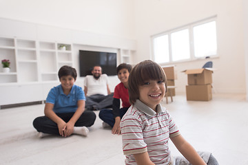 Image showing portrait of happy young boys with their dad