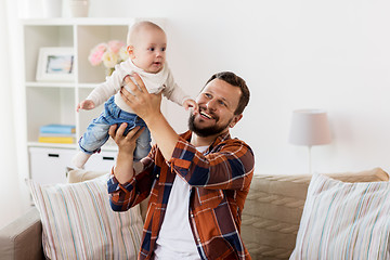 Image showing happy father with little baby boy at home