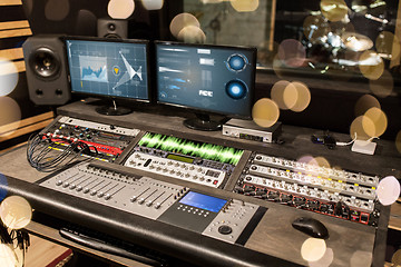 Image showing music mixing console at sound recording studio