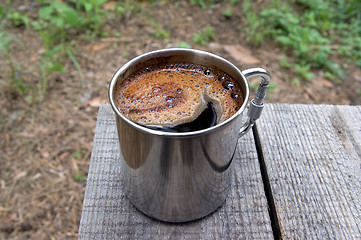 Image showing Metal mug of coffee