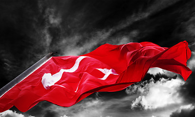 Image showing Flag of Turkey waving against black and white sky