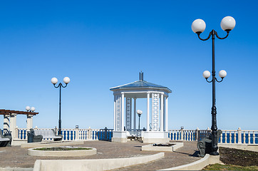 Image showing A beautiful romantic gazebo in the park on blue sky background 