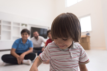 Image showing portrait of happy young boys with their dad