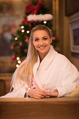 Image showing woman drinking champagne at spa