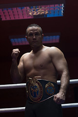 Image showing kick boxer with his championship belt