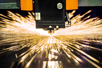 Image showing CNC Laser cutting of metal, modern industrial technology.