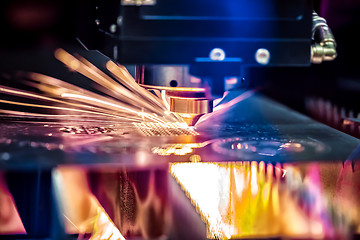 Image showing CNC Laser cutting of metal, modern industrial technology.