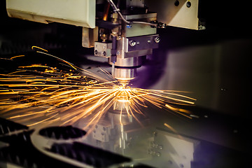 Image showing CNC Laser cutting of metal, modern industrial technology.