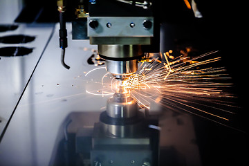Image showing CNC Laser cutting of metal, modern industrial technology.