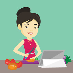 Image showing Woman cooking healthy vegetable salad.