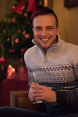 Image showing Happy young man with a glass of champagne