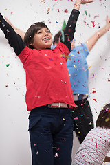 Image showing kids  blowing confetti