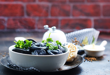 Image showing black dumplings