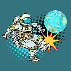 Image showing Astronaut plays planet Earth football