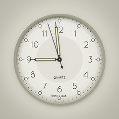 Image showing a clock showing three seconds to nine