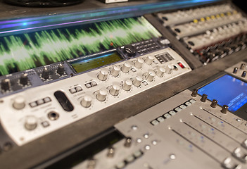 Image showing music mixing console at sound recording studio