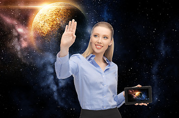 Image showing smiling businesswoman with tablet pc over space