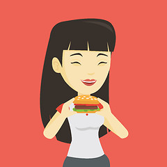 Image showing Woman eating hamburger vector illustration.