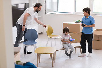 Image showing boys in a new modern home