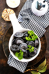 Image showing black dumplings