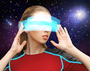 Image showing woman in virtual reality glasses over space