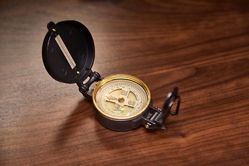 Image showing Compass on a desk