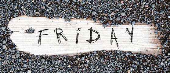 Image showing Sand on planked wood - Friday