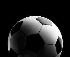 Image showing Soccer or football ball in the backlight on black background. Vector close-up illustration