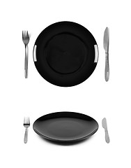 Image showing Black plate with fork and knife