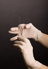 Image showing Flicking syringe