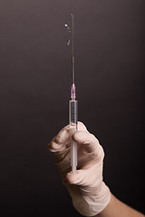 Image showing Flicking syringe