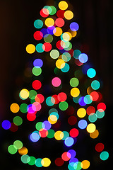 Image showing Unfocused Bright lights of Christmas Tree