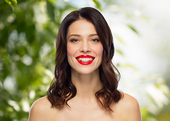 Image showing beautiful smiling young woman with red lipstick