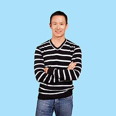 Image showing Asian man in striped pullovert