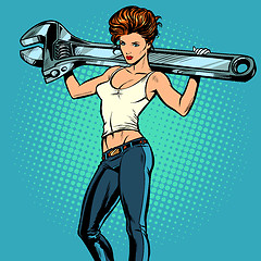 Image showing Beautiful woman with a wrench