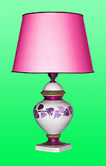 Image showing Vintage table lamp on a green background